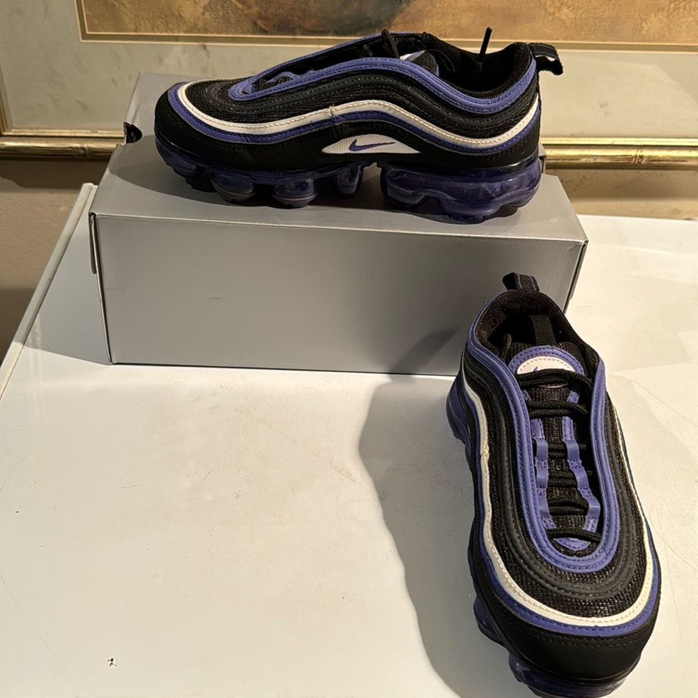 Nike. Purple, black and white. Worn a couple of times but still looks good.